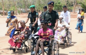 Army coordinates distribution of Wheelchairs in Batticoloa District