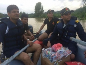 Indian Naval persons assist rescue and relief operation