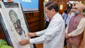 President unveils Mahatma Gandhi portrait in commemoration of 150th birth anniversary