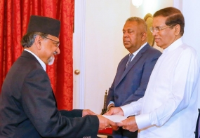 Four new envoys present credentials to President