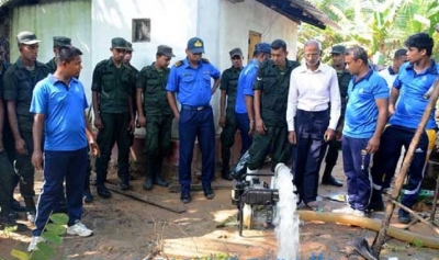 Navy assists cleaning drinking water wells in flood-hit North